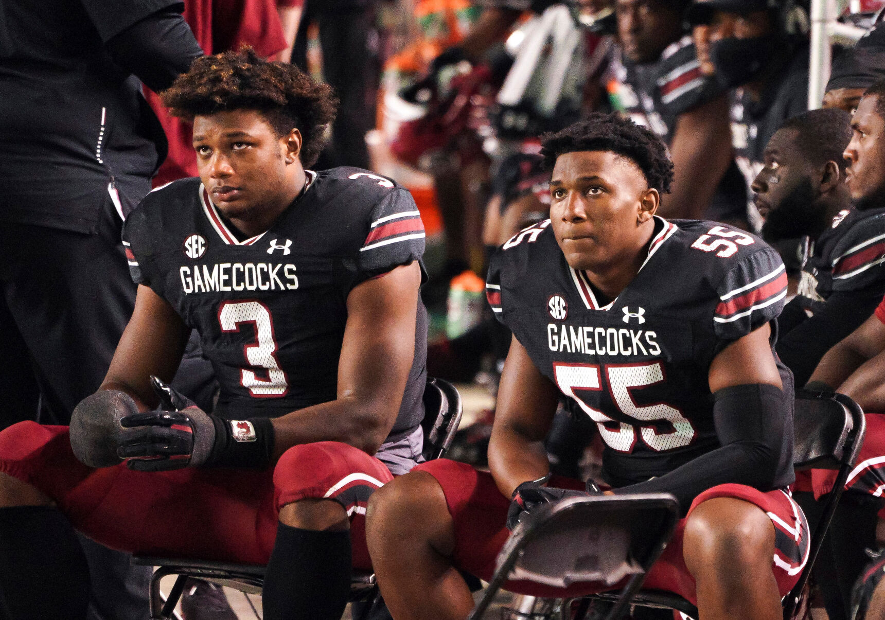 South Carolina linebackers watch from the sideline